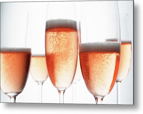 White Background Metal Print featuring the photograph Close Up Of Glasses Of Champagne by Brett Stevens