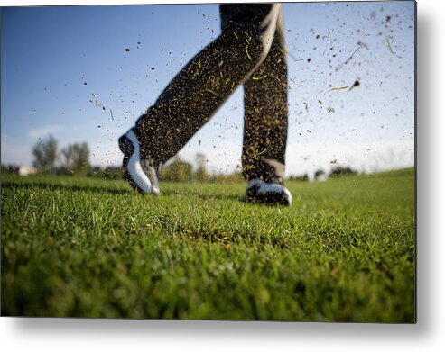 Young Men Metal Print featuring the photograph Close-up Of Golfers Swing by Lane Oatey
