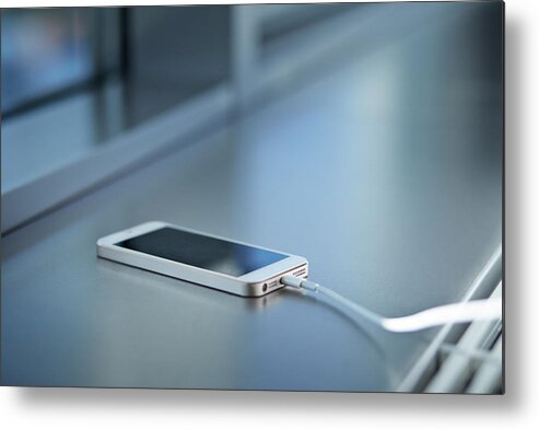 Office Metal Print featuring the photograph Close-up Of Smartphone Charging by Klaus Vedfelt