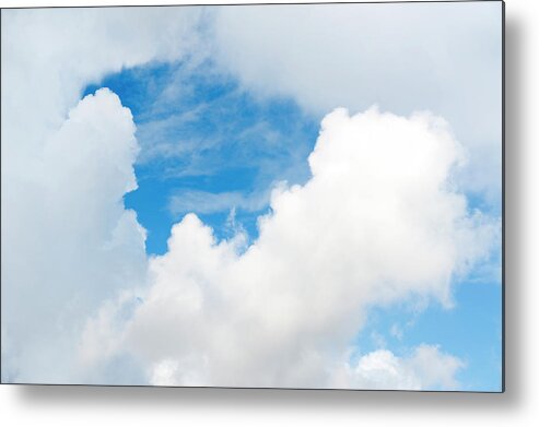 Directly Below Metal Print featuring the photograph Cumulus Clouds And Patch Of Blue by Stuart Mccall