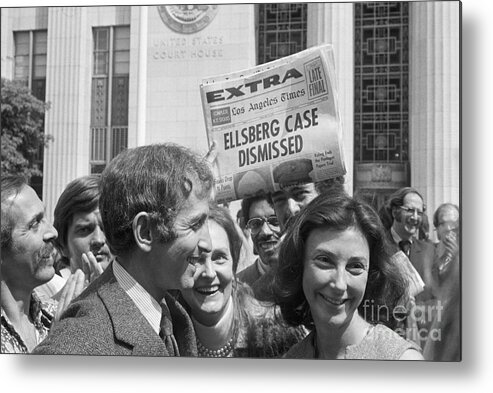 People Metal Print featuring the photograph Daniel Ellsberg And Wife Walk From Court by Bettmann