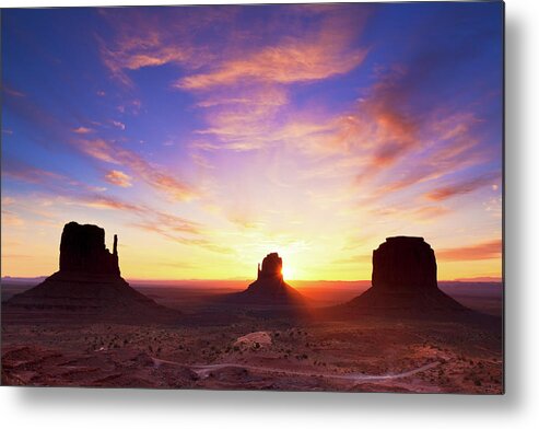 Dawn Metal Print featuring the photograph Dawn At Monument Valley by Glowingearth