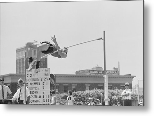 Young Men Metal Print featuring the photograph Dick Fosbury Trying To Clear Bar by Bettmann