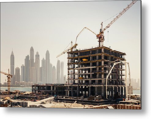 Working Metal Print featuring the photograph Dubai Construction by Borchee