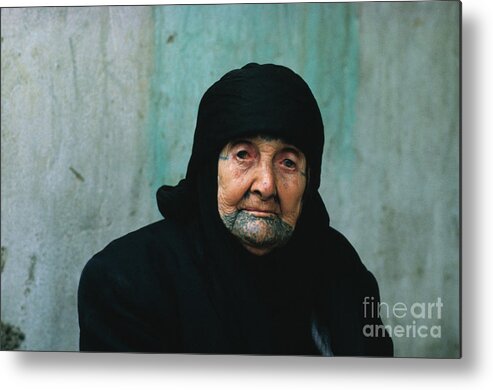 1980-1989 Metal Print featuring the photograph Elderly Palestinian Woman With Tattoo by Bettmann