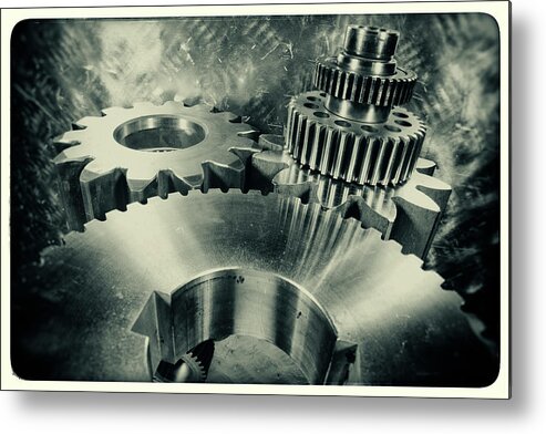 Gears Metal Print featuring the photograph Engineering Parts With Gears And Cogs by Christian Lagereek