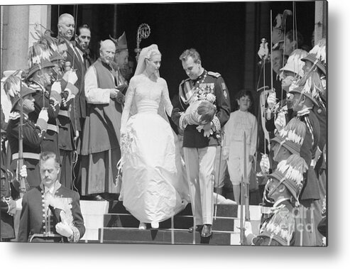 Crowd Of People Metal Print featuring the photograph Grace Kelly And Prince Rainier Exiting by Bettmann