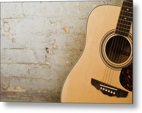 Music Metal Print featuring the photograph Guitar And Brick Wall by Jupiterimages