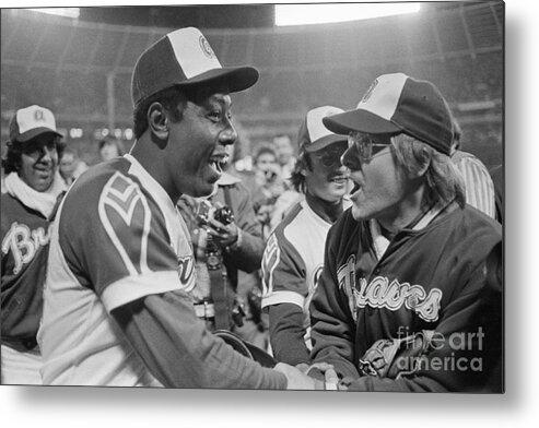 People Metal Print featuring the photograph Hank Aaron And Tom House Shaking Hands by Bettmann