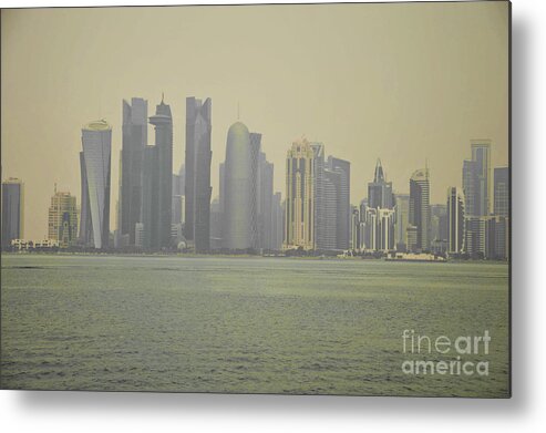 Skyline Metal Print featuring the photograph Hazy Doha skyline by Yavor Mihaylov