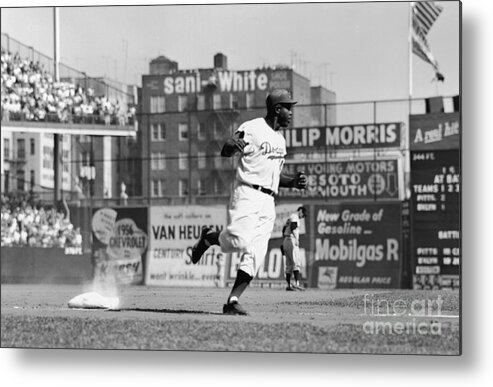 1950-1959 Metal Print featuring the photograph Jackie Robinson Rounds The Bases by Robert Riger