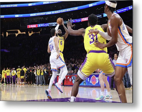 Lebron James Metal Print featuring the photograph LeBron James Shoots the Ball to Break Kareem Abdul-Jabbar's All-Time Scoring Record by Nathaniel S. Butler