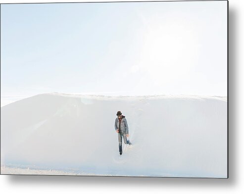 Man Metal Print featuring the photograph Man Walking At White Sands National Monument Against Sky On Sunny Day by Cavan Images