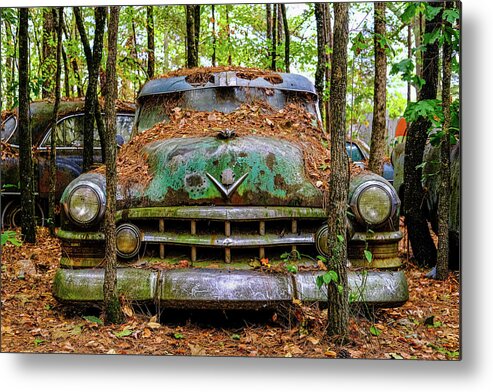 Abandoned Metal Print featuring the photograph Old Caddy into Trees by Darryl Brooks