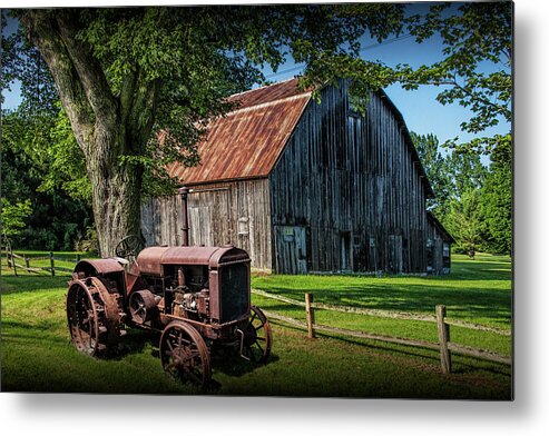Barn Metal Print featuring the photograph Old Vintage McCormick Deering Tractor with old weathed Barn by Randall Nyhof