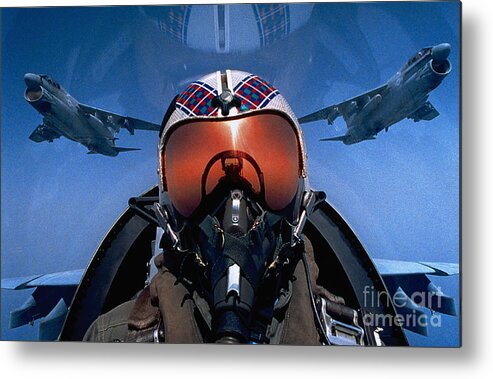 Protective Face Mask Metal Print featuring the photograph Pilot In Cockpit Of Jet by Stocktrek
