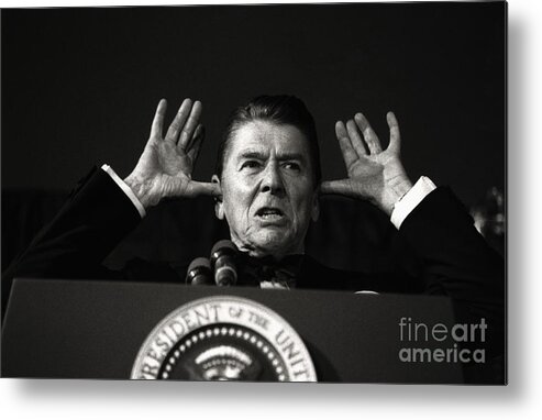 1980-1989 Metal Print featuring the photograph President Reagan Making Gesture by Bettmann