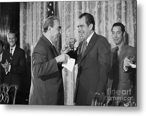 Hiding Metal Print featuring the photograph President Richard Nixon And Premier by Bettmann