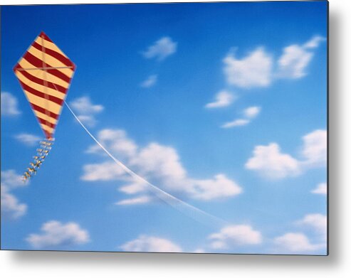 Environmental Conservation Metal Print featuring the photograph Red And Yellow Striped Kite Flying In by Nick Dolding