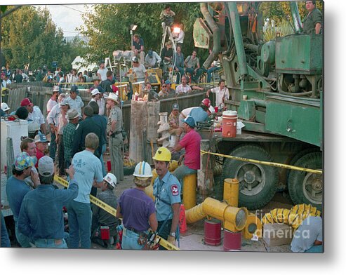 1980-1989 Metal Print featuring the photograph Rescuers Digging To Save Baby Jessica by Bettmann