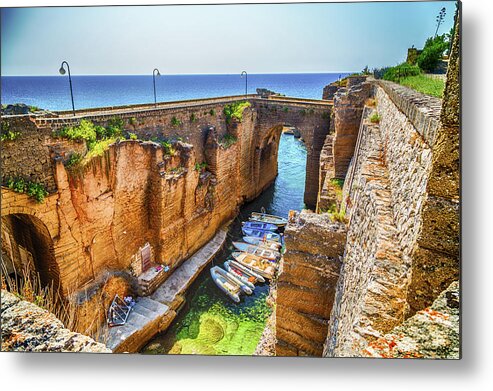 Coasting Metal Print featuring the photograph Rocks and architecture on the Salento coast by Vivida Photo PC