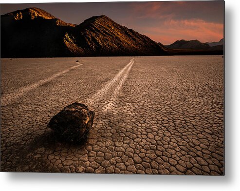 Death Metal Print featuring the photograph Rocks Walking In Sunset by Jie Jin