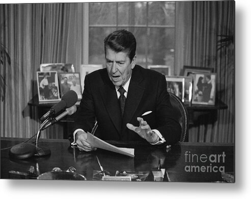 1980-1989 Metal Print featuring the photograph Ronald Reagan Performing Radio Broadcast by Bettmann