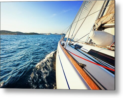 Curve Metal Print featuring the photograph Sailing In The Wind With Sailboat At by Mbbirdy