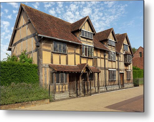 Half-timbered Metal Print featuring the photograph Shakespeares birthplace by Paul Cowan