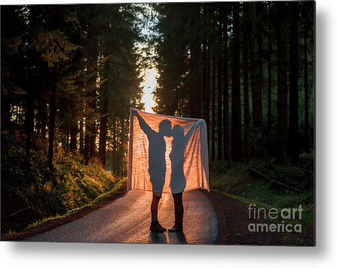 Young Men Metal Print featuring the photograph Silhouette Of Couple Holding Blanket by Westend61