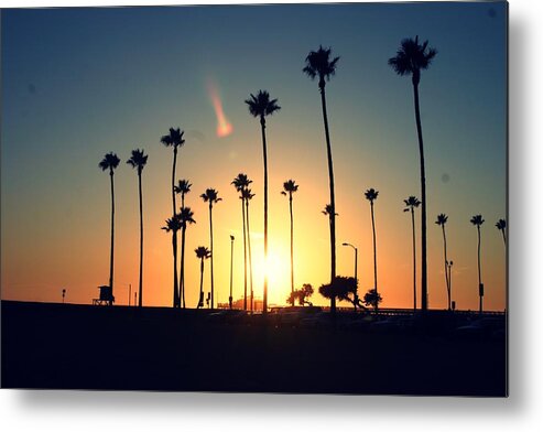 Tranquility Metal Print featuring the photograph Silhouette Of Palm Trees At Sunset by Photo By Natalie Wilson