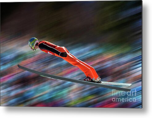 Young Men Metal Print featuring the photograph Ski Jumper In Mid-air Against Blurred by Technotr