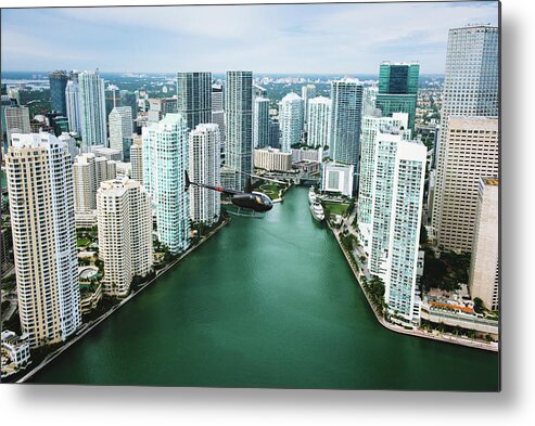 Flying Metal Print featuring the digital art Skyscrapers And Helicopter Above Miami River, Brickell, Downtown Miami, Florida, Usa by Corey Jenkins