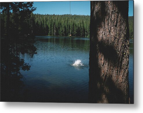 Splash Metal Print featuring the photograph Small Splash Of Water Beneath A Rope Swing On A Pretty Lake. by Cavan Images