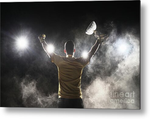 Soccer Uniform Metal Print featuring the photograph Soccer Player Holding Crystal Cup by Stanislaw Pytel