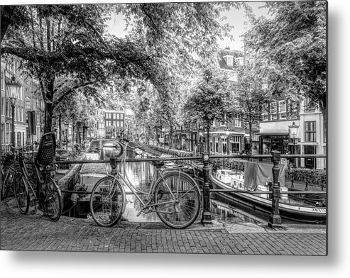 Boats Metal Print featuring the photograph The Black Bike in Amsterdam by Debra and Dave Vanderlaan