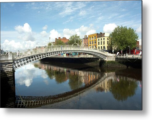Dublin Metal Print featuring the photograph The Famous Hapenny Bridge In Dublin by Stevenallan