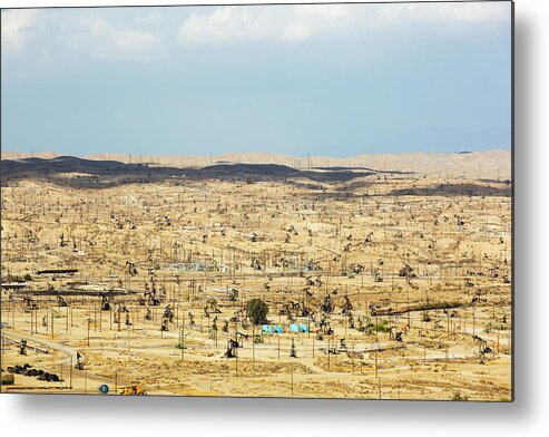 Usa Metal Print featuring the photograph The Kern River Oilfield In Oildale, Bakersfield, California, Usa. Following An Unprecedented Four Year Long Drought, Bakersfield Is Now The Driest City In The Usa, Driven By Climate Change. by Cavan Images