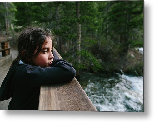 Girl Metal Print featuring the photograph Thoughtful Girl Looking Away While Leaning On Bannister At Inyo National Forest by Cavan Images