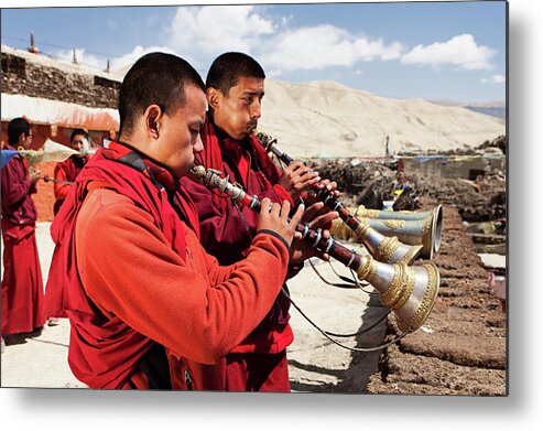 Chinese Culture Metal Print featuring the photograph Tibetan Monks Playing Buddhist Horns by Hadynyah
