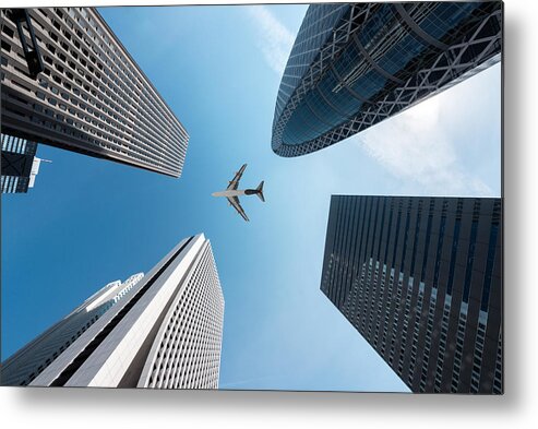 Cityscape Metal Print featuring the photograph Tokyo Skyscrapers Buildings And A Plane by Prasit Rodphan