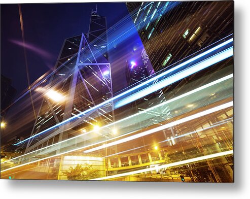 In A Row Metal Print featuring the photograph Traffic Through Street With Blur Light by Loveguli