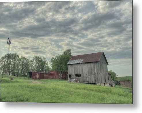 Clouds Metal Print featuring the photograph Train Cars and a Barn by Laura Hedien