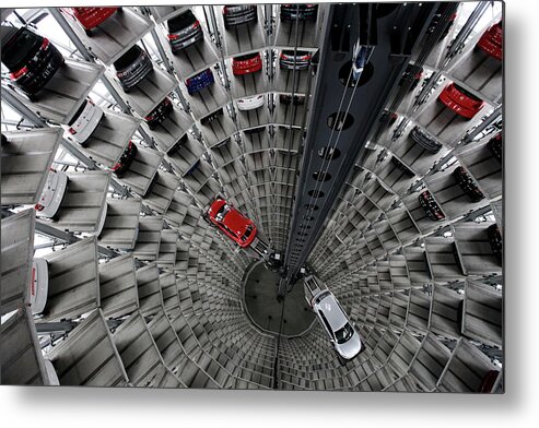 Volkswagen Autostadt Metal Print featuring the photograph Volkswagen Ag Announces 2009 Annual by Sean Gallup