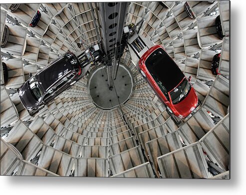 Volkswagen Autostadt Metal Print featuring the photograph Volkswagen Ag Presents Financial by Sean Gallup