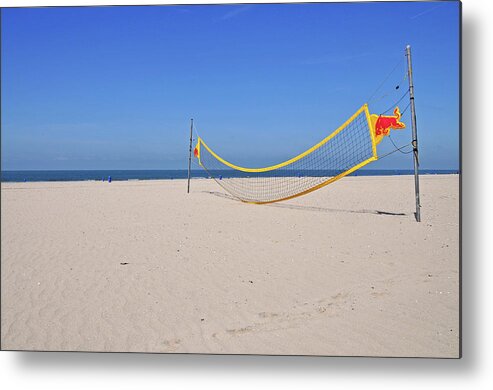 Tranquility Metal Print featuring the photograph Volleyball Net On Beach by Leuntje