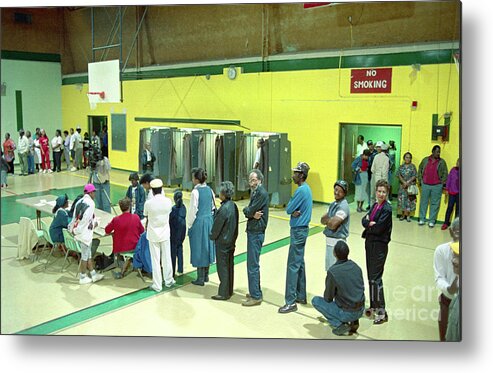 Democracy Metal Print featuring the photograph Voters Waiting To Cast Ballots In Baton by Bettmann
