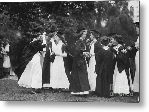 People Metal Print featuring the photograph Women Graduates Exiting After Ceremony by Bettmann