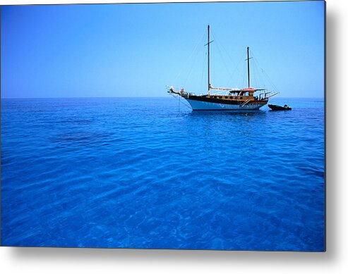 Tranquility Metal Print featuring the photograph Yacht Anchored In Waters Of Gulf Of by Dallas Stribley