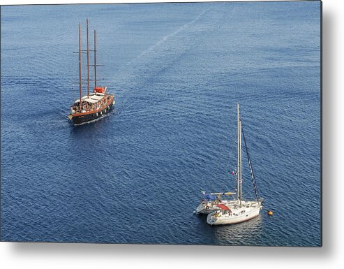 Sailing Metal Print featuring the photograph Yachts sailing on a blue calm sea by Michalakis Ppalis